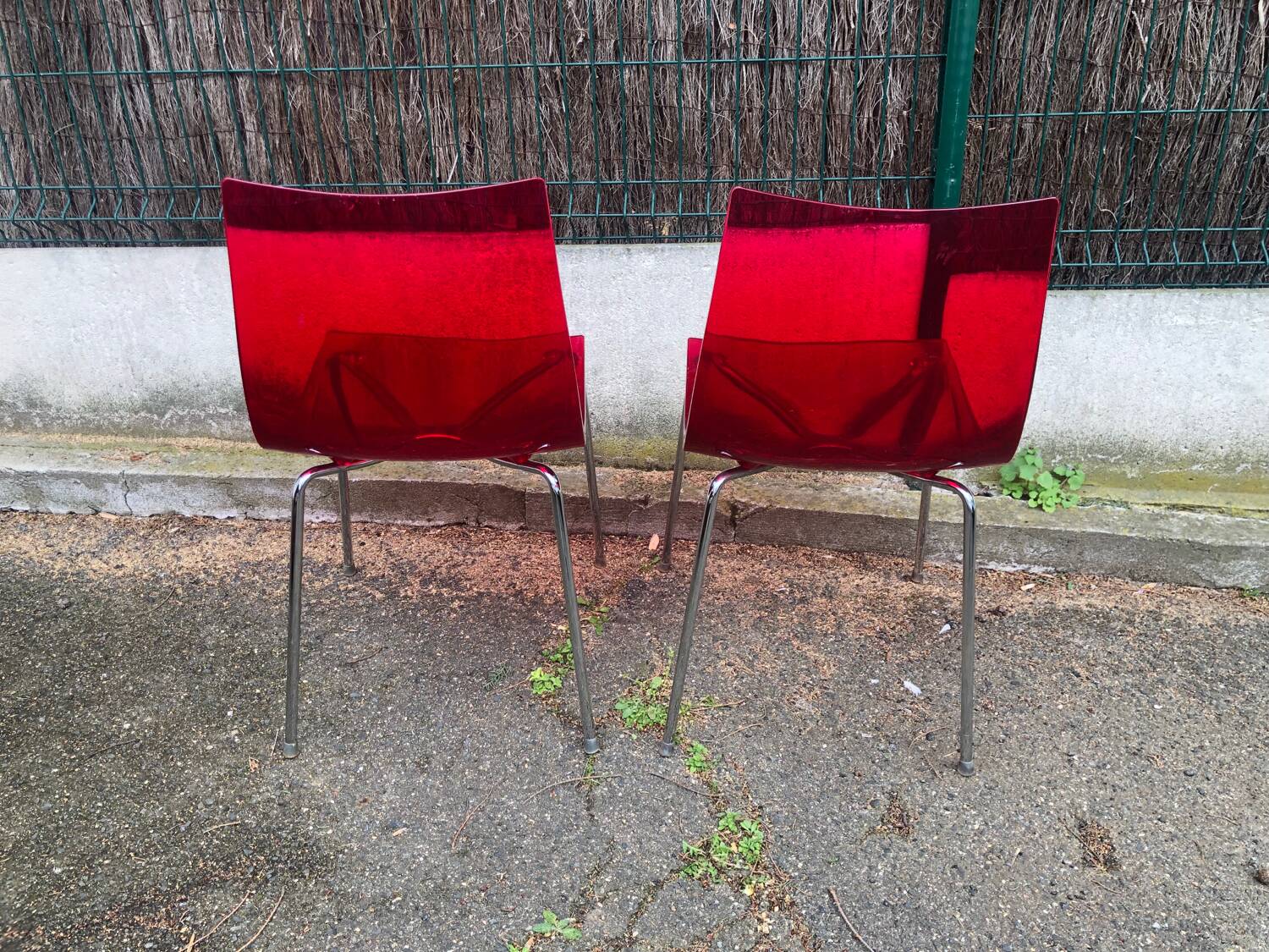 Pair of Foschia Plexiglas red designer chairs