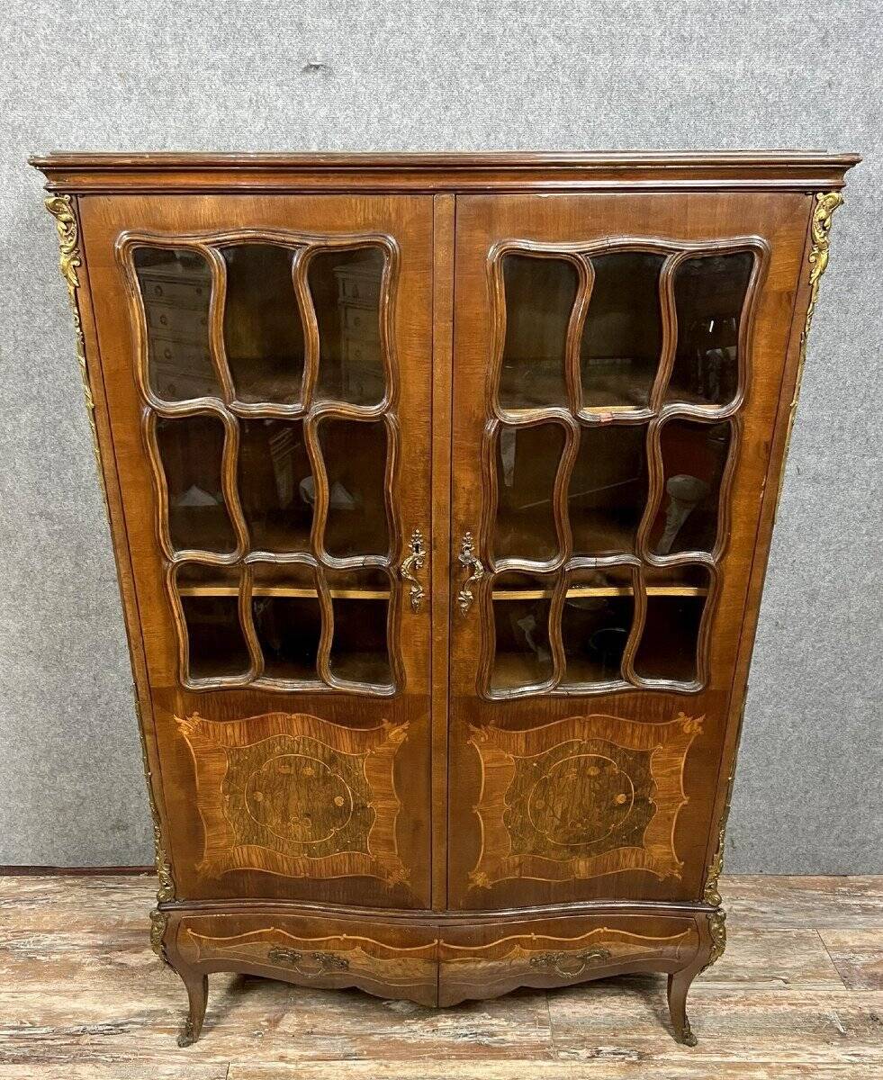 Louis XV style curved bookcase in precious wood marquetry