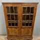 Louis XV style curved bookcase in precious wood marquetry