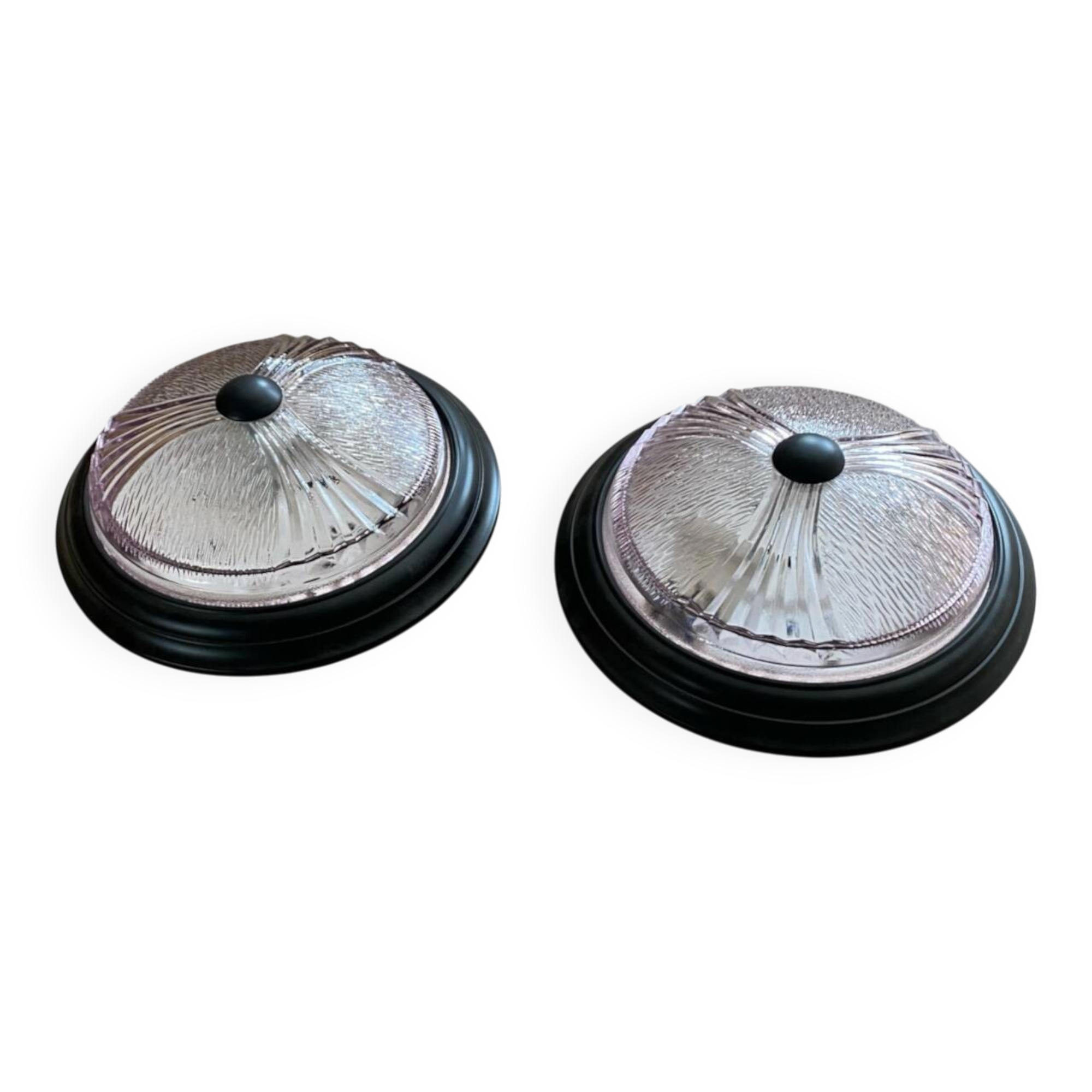 Pair of slightly pink glass ceiling lights and vintage black metal.