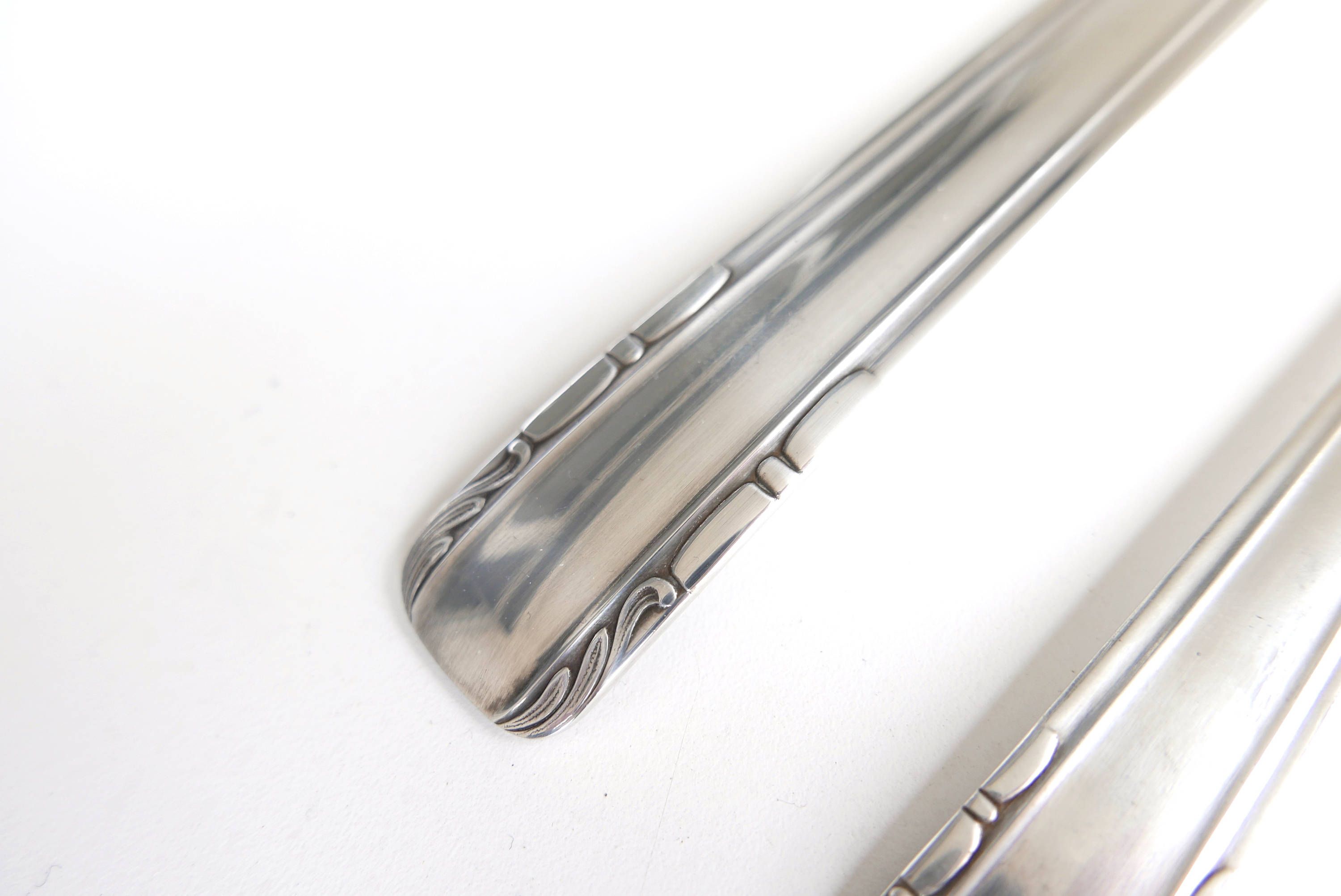 37 pieces cutlery setof silver metal with punches, 50s