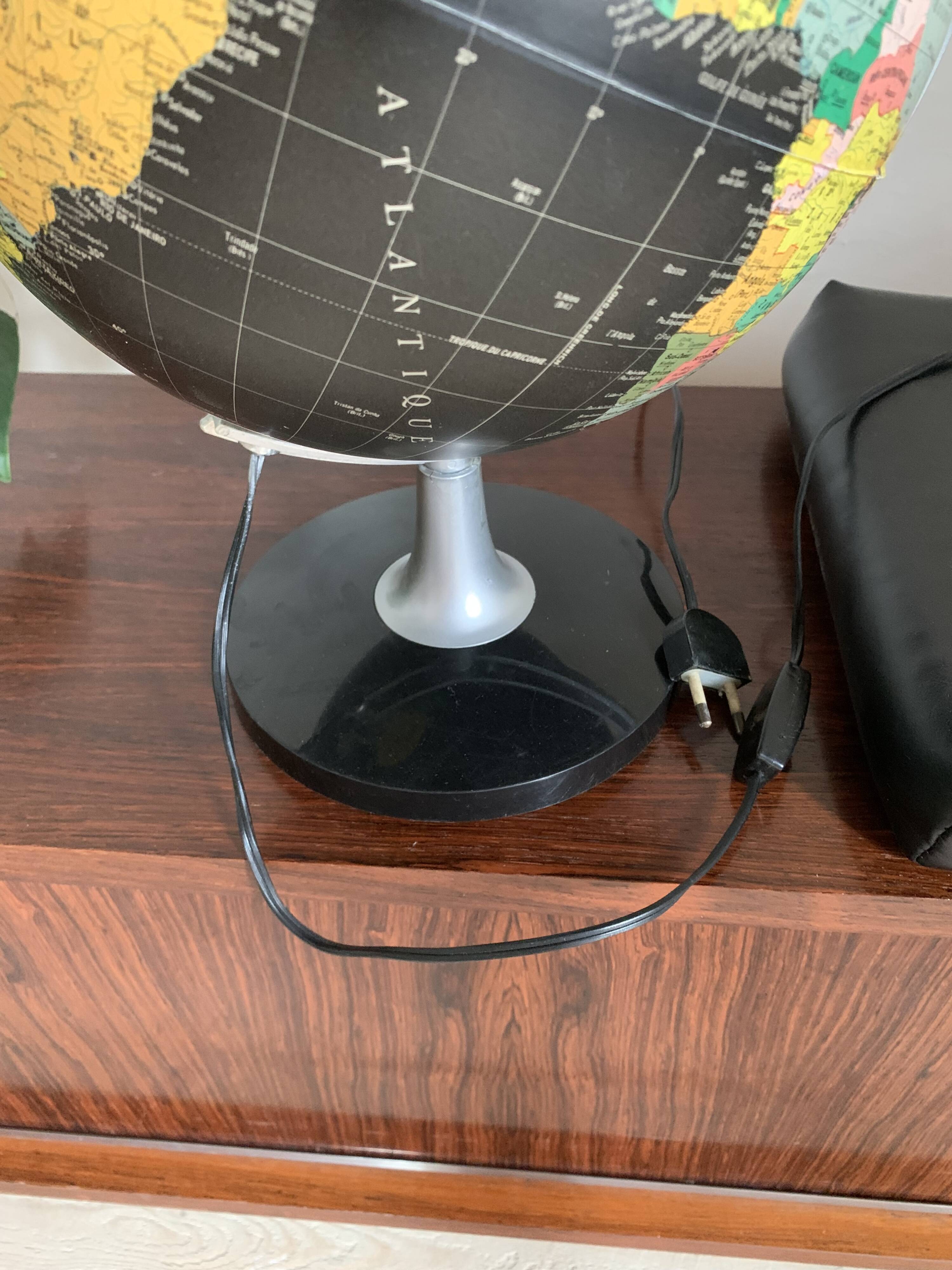 Black world map globe