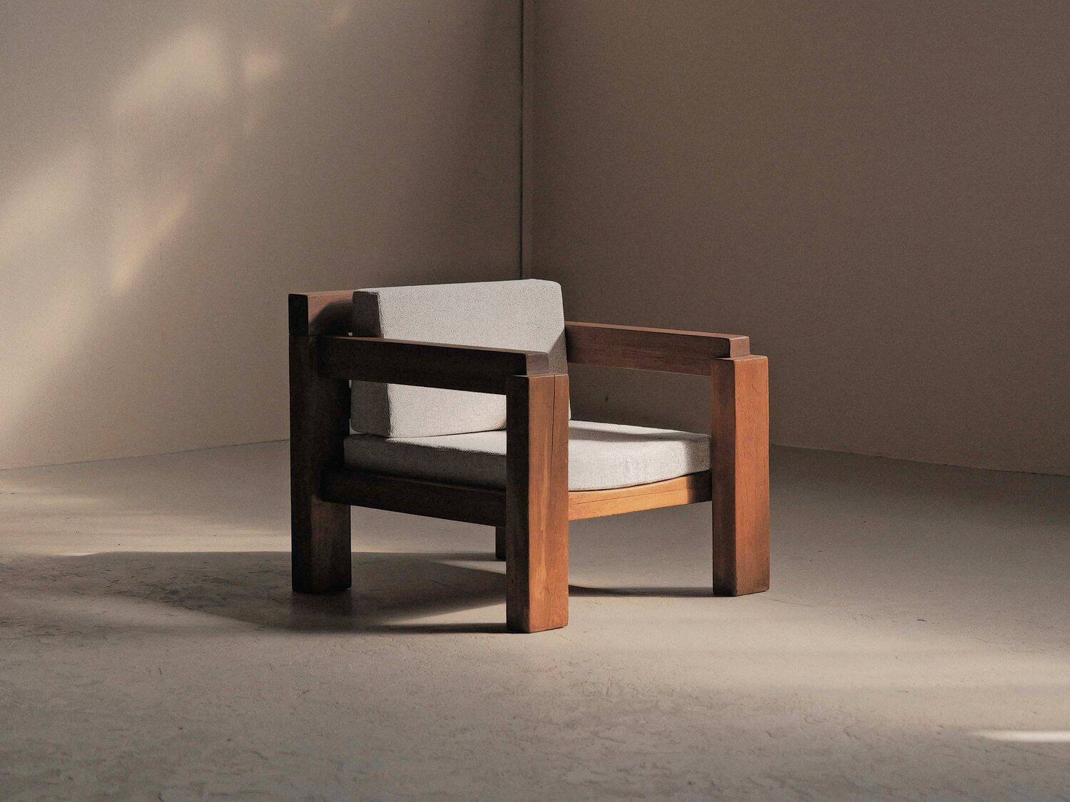 Handcrafted armchair in solid wood and fabric, 1980s-90s.