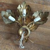 Design wall lamp in gold metal