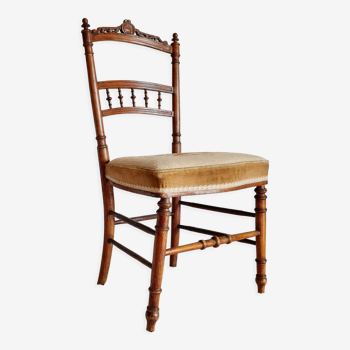 Antique wooden chair sitting velvet floral