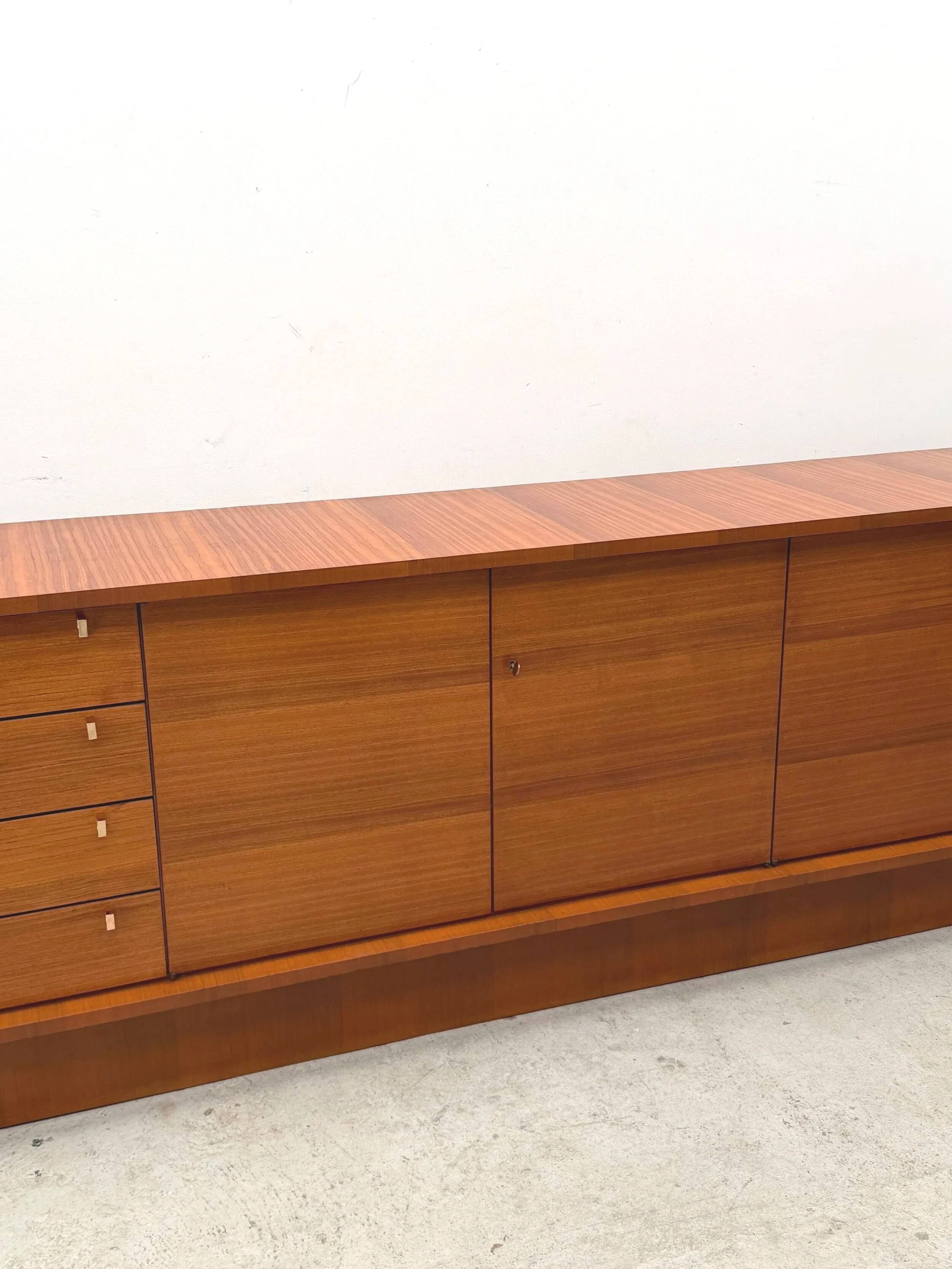Enfilade by Robert DEBIEVE in mahogany veneer and brass, France 1950.