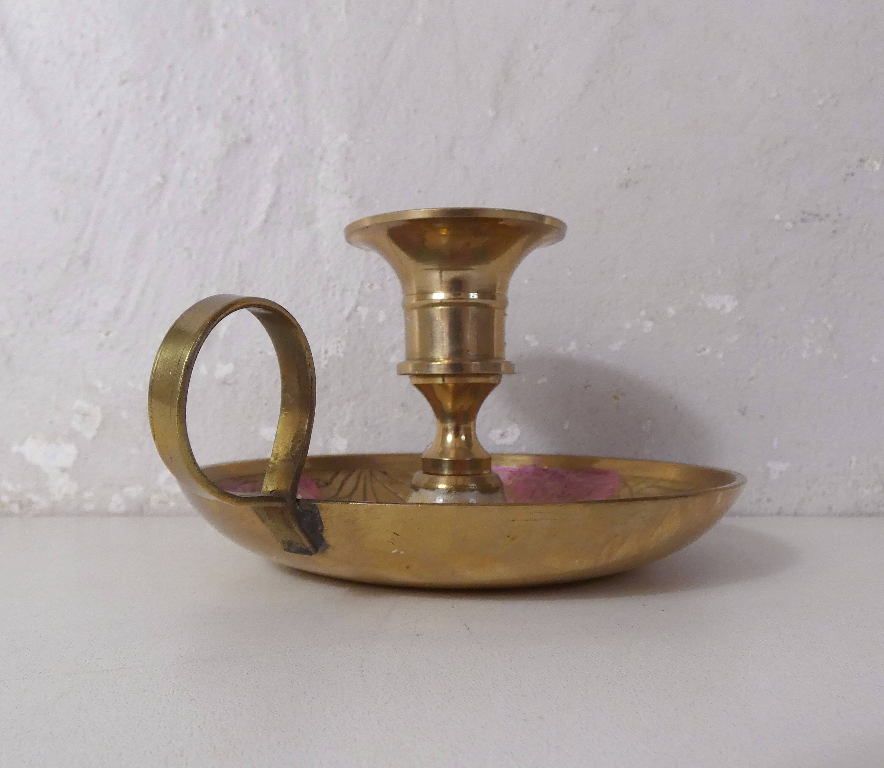 Vintage enameled brass hand candle holder