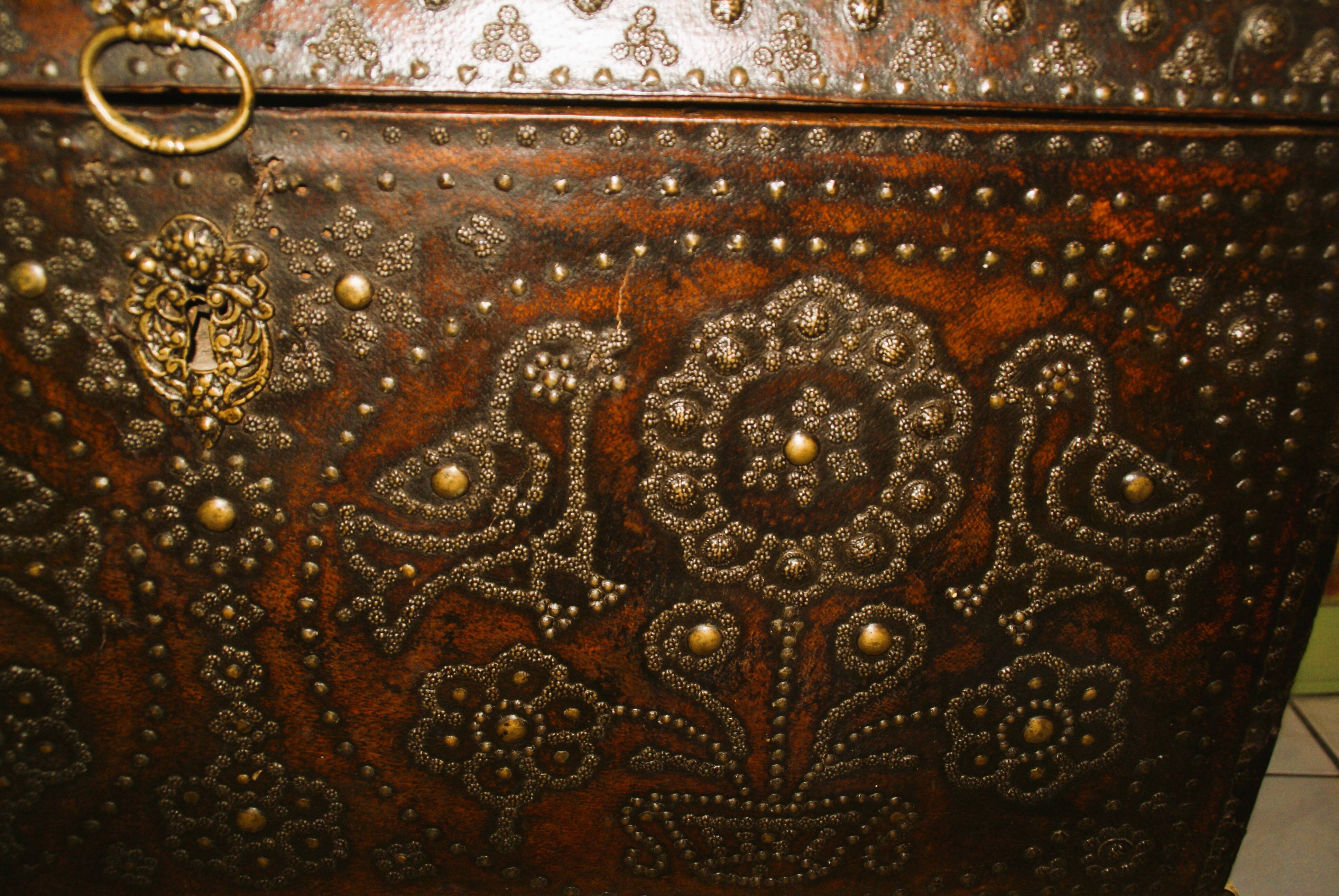 17th century studded leather travel trunk, richly decorated