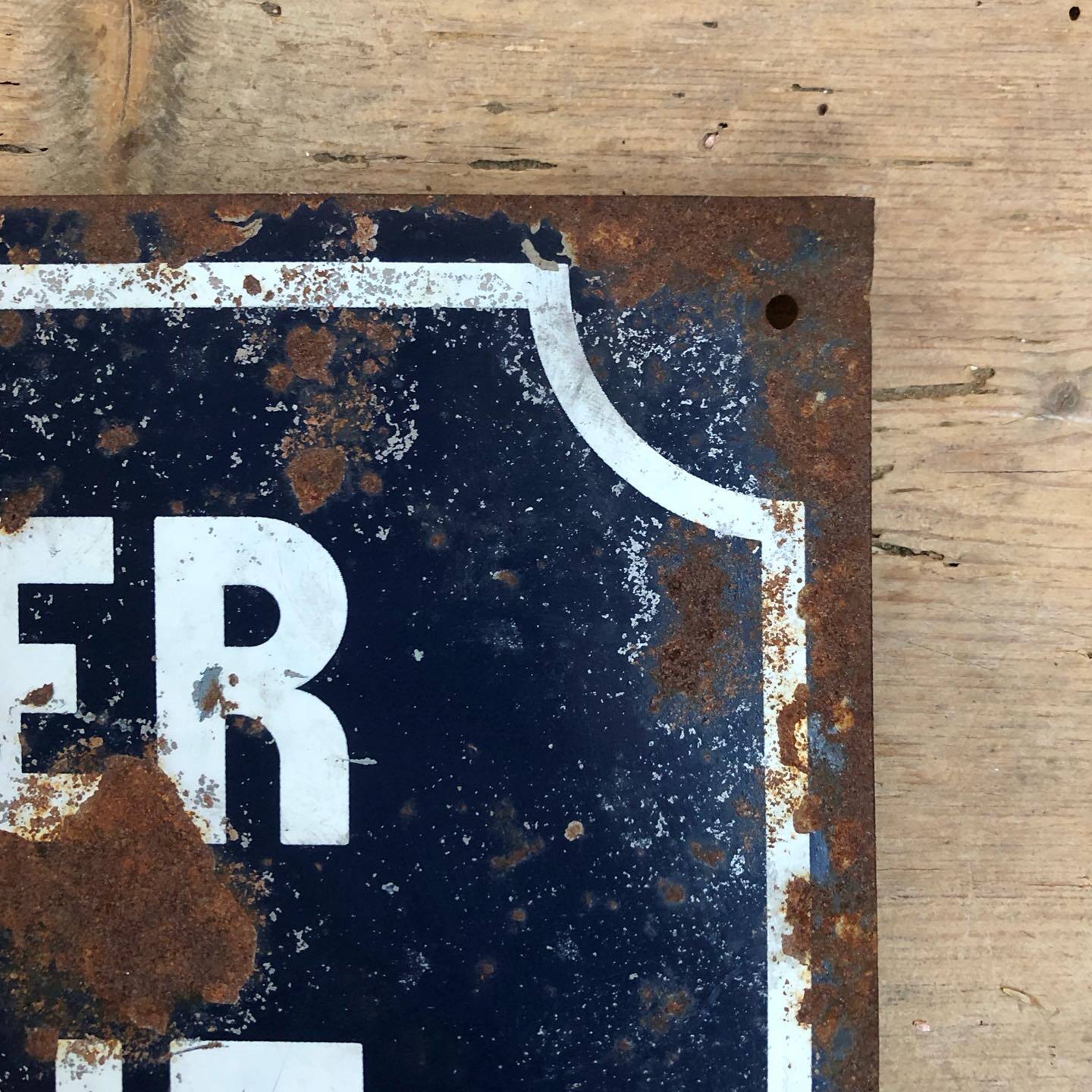 Enameled sign construction site prohibited