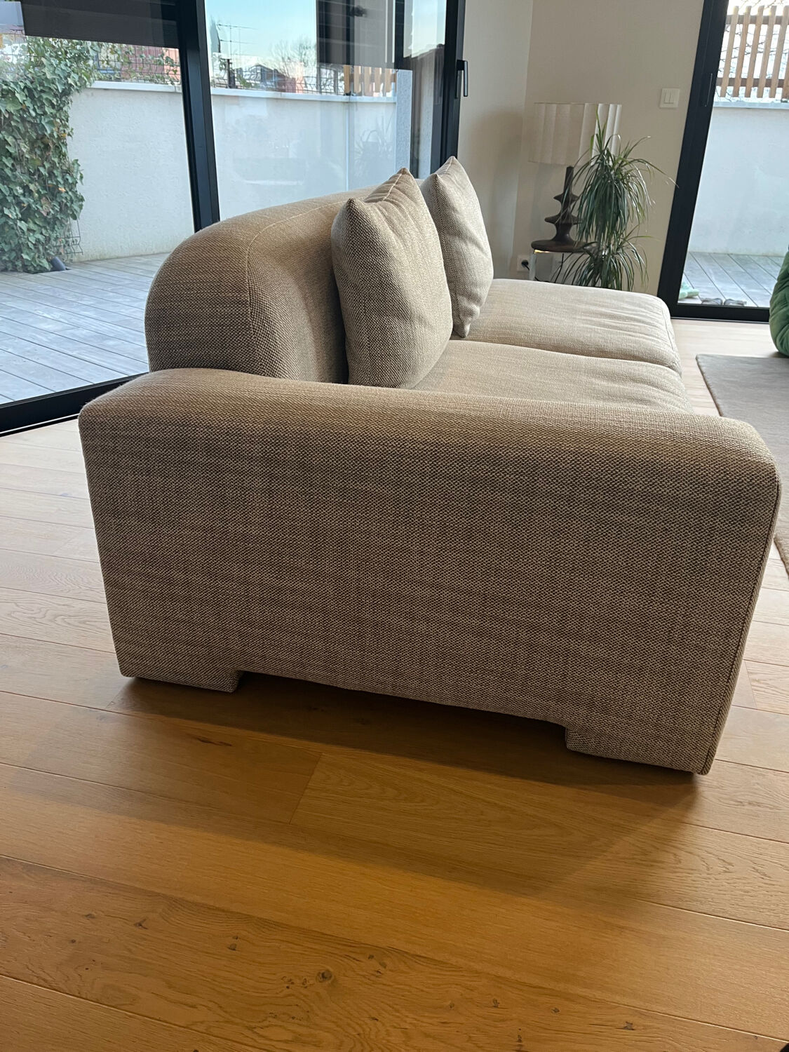 Three-seater fabric sofa