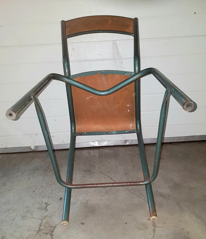 Old science school chair in tube