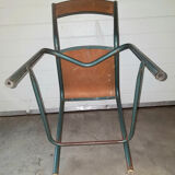 Old science school chair in tube