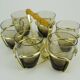 Set of 6 midcentury shot glasses in a brass holder with bamboo handle 1950s