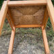 Brutalist chair in solid pine with a straw seat from the 1970s.