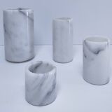 Four white marble candlesticks with black veins, 70s design