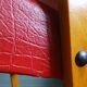 Compass leg armchair in solid beech & red crocodile-effect faux leather