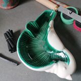 Empty green and white ceramic bird pocket