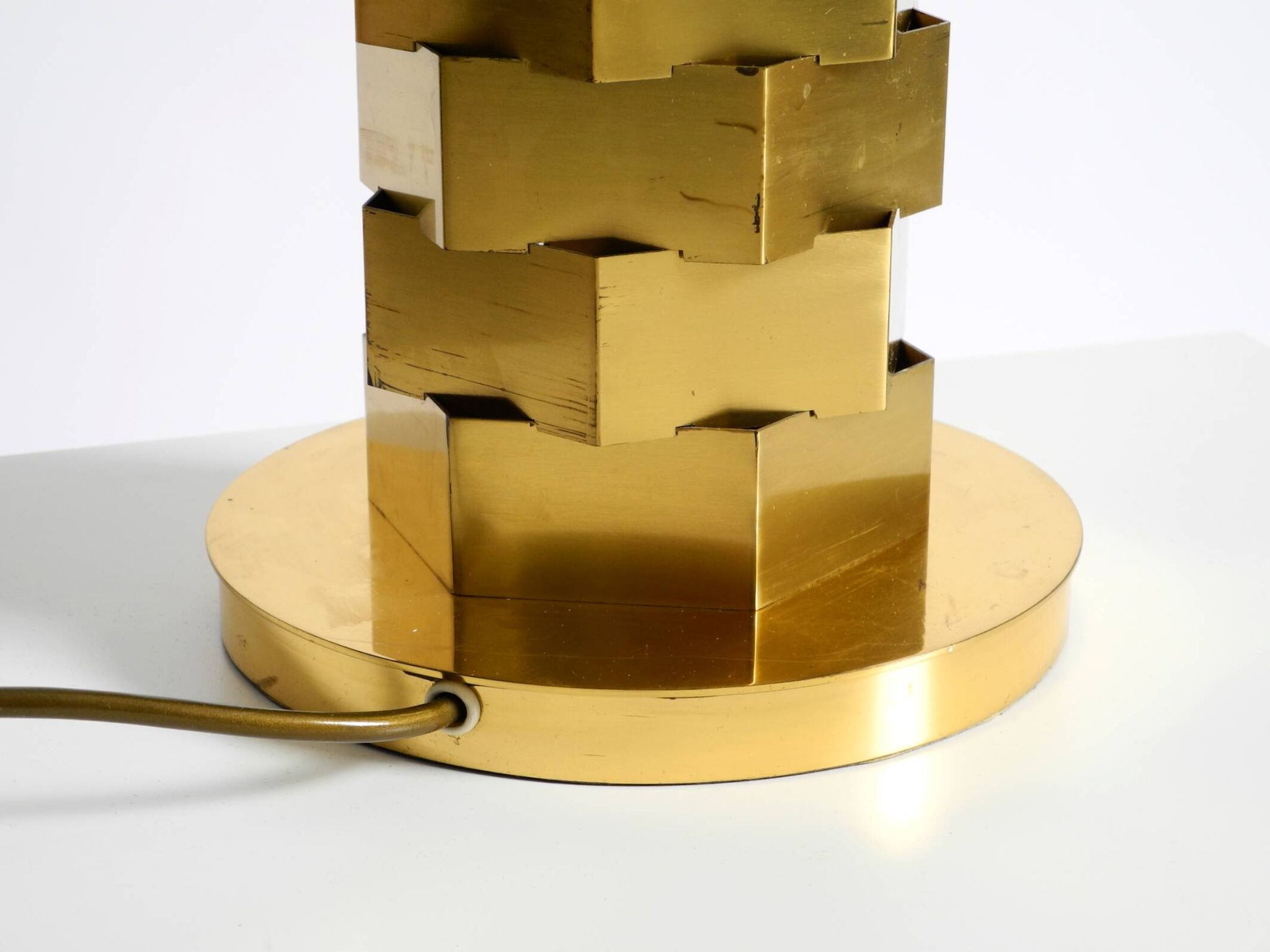 1960s brass table lamp by Vereinigte Werkstätten with an illuminated base