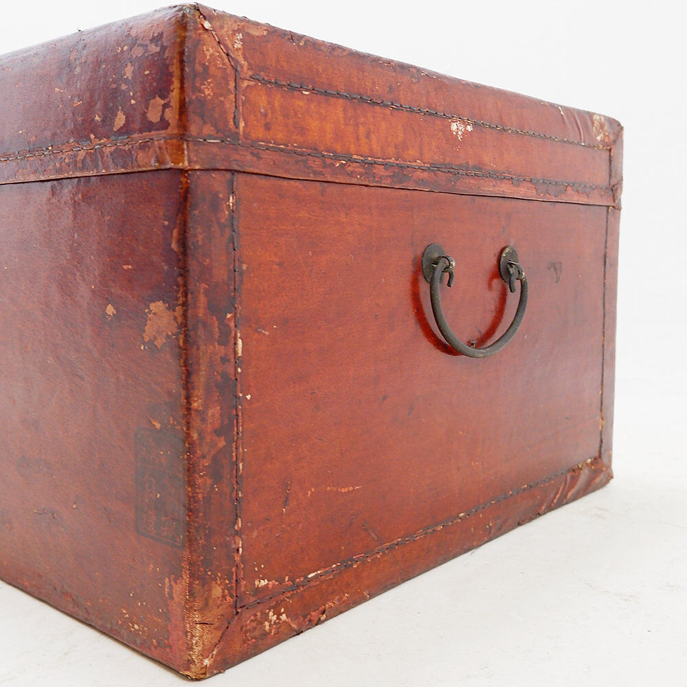 Chinese red lacquered leather trunk from the early 20th century.