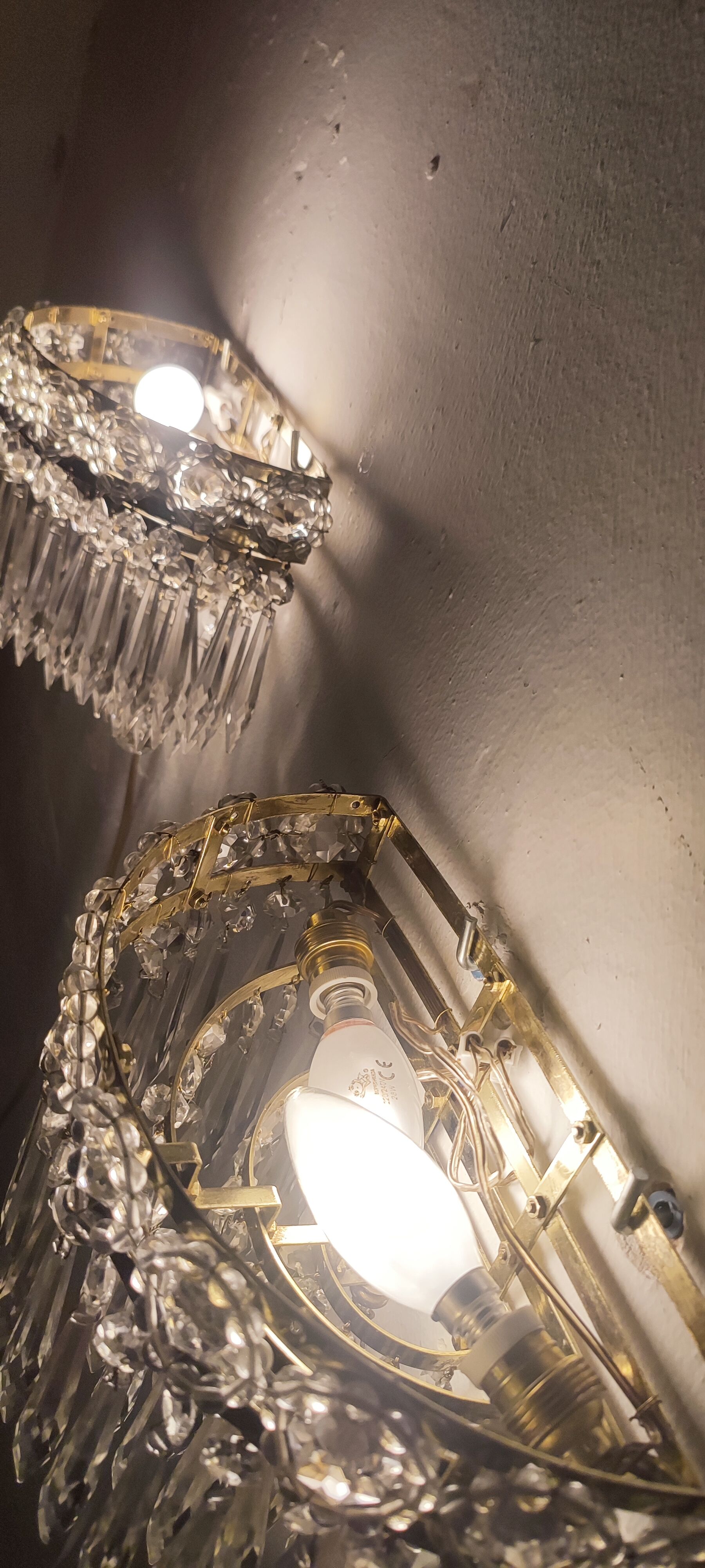 Classic crystal sconces. France, 1950s