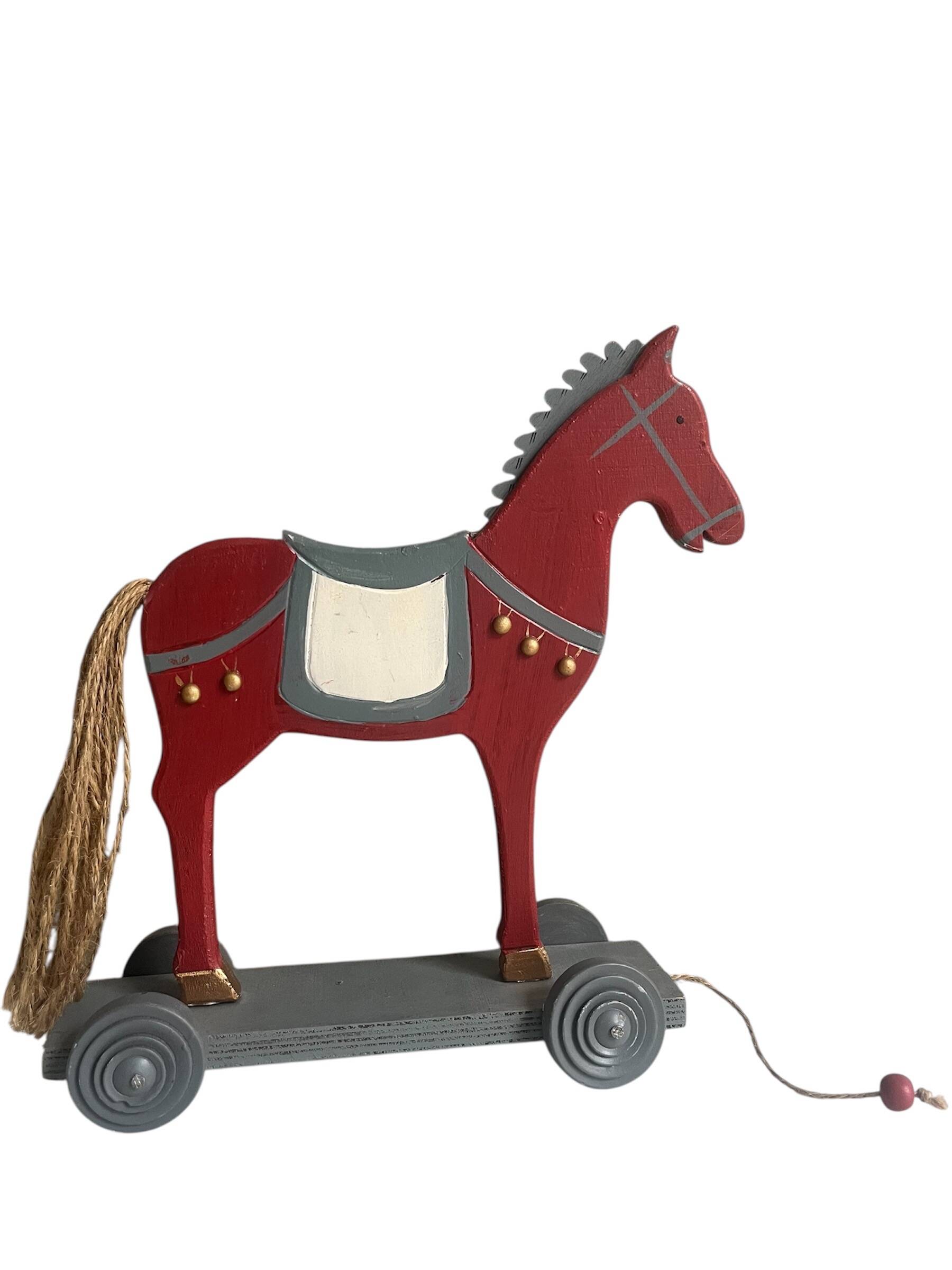 Antique toy, small horse on wheels