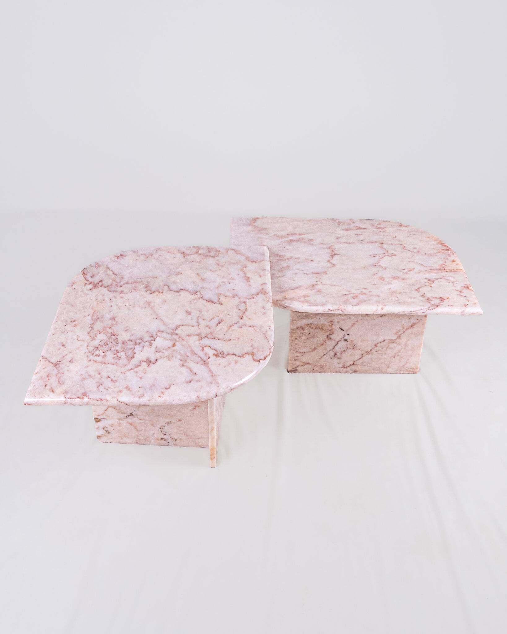 Pair of nesting coffee tables in pink marble, France, 1970s