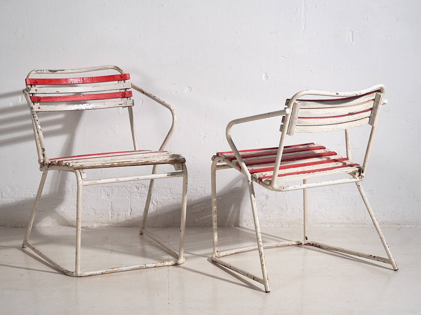 Antique outdoor stacking chairs (circa 1920). Set of 2 pieces.