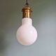 Large bulbous pendant light in white opaline and brass