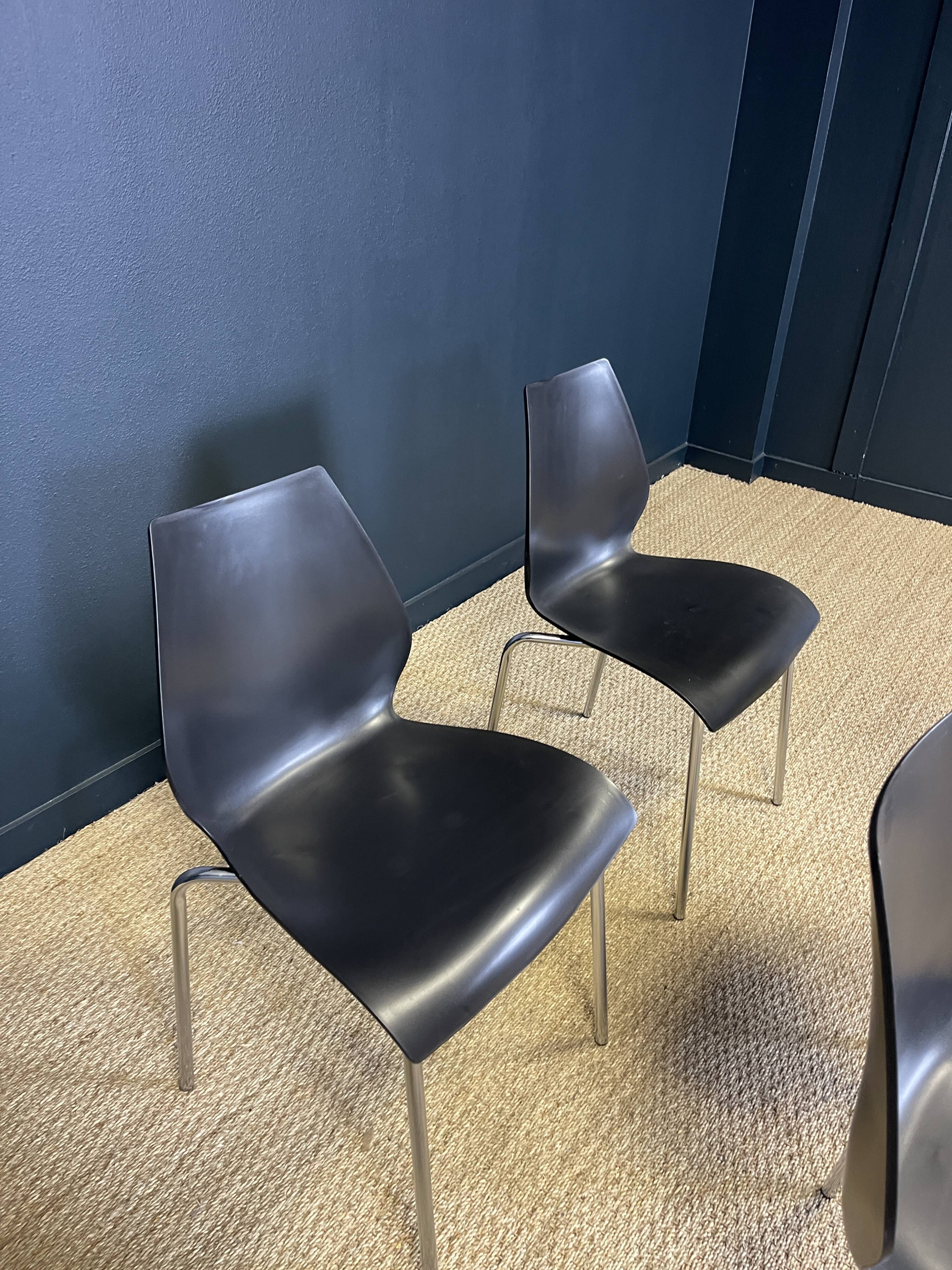 Set of 4 black dining room chairs from the 2000s