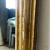 19th century mercury mirror with wooden frame and gilded stucco