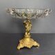 Antique crystal bowl on a bronze stand.