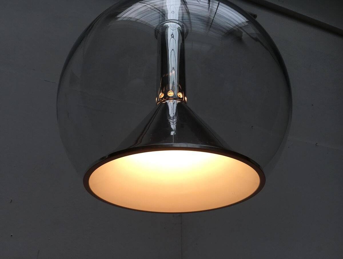 Suspended globe lamp in glass from the German space age by Erco.