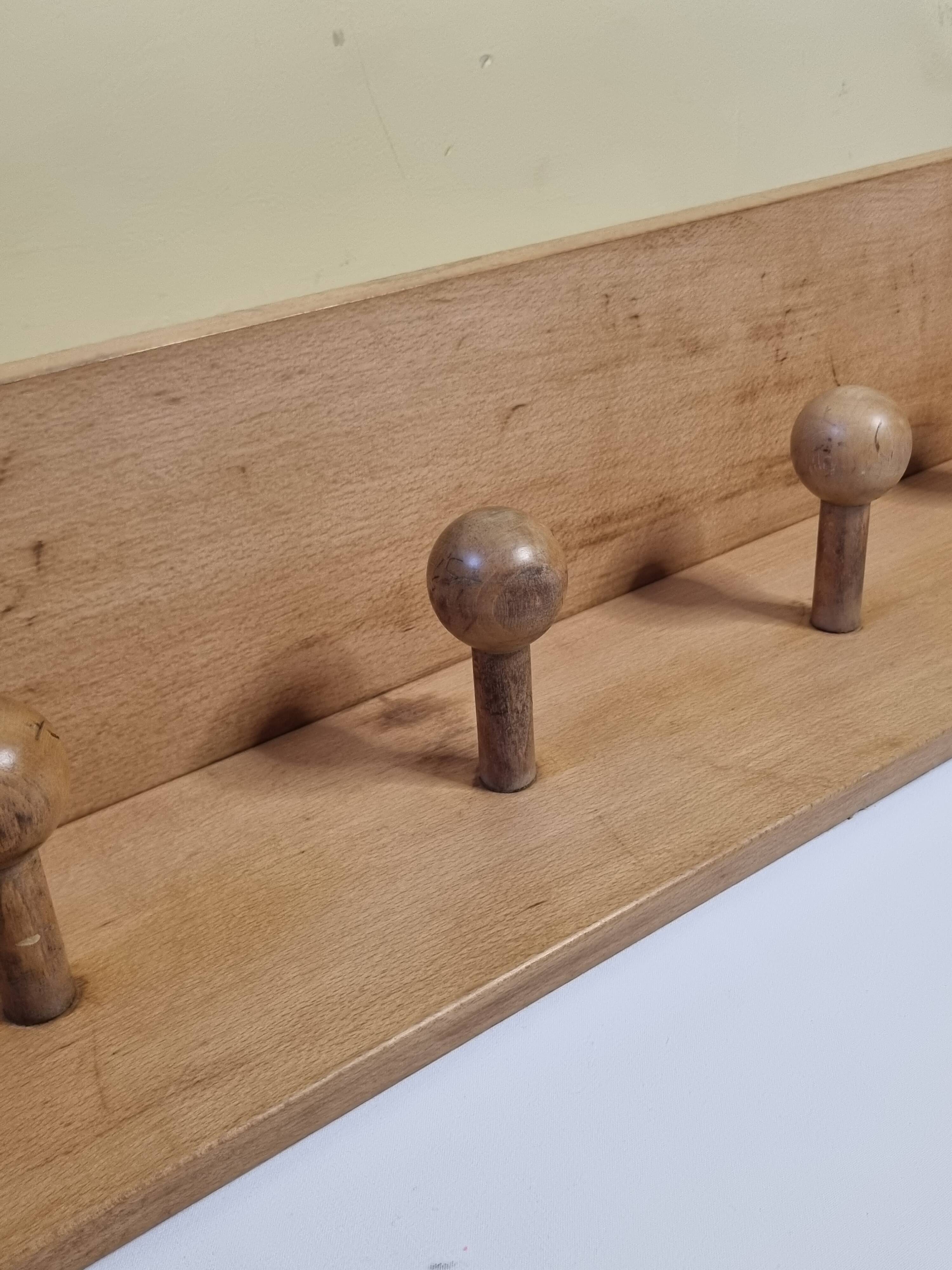 Wall-mounted coat rack, alpine design