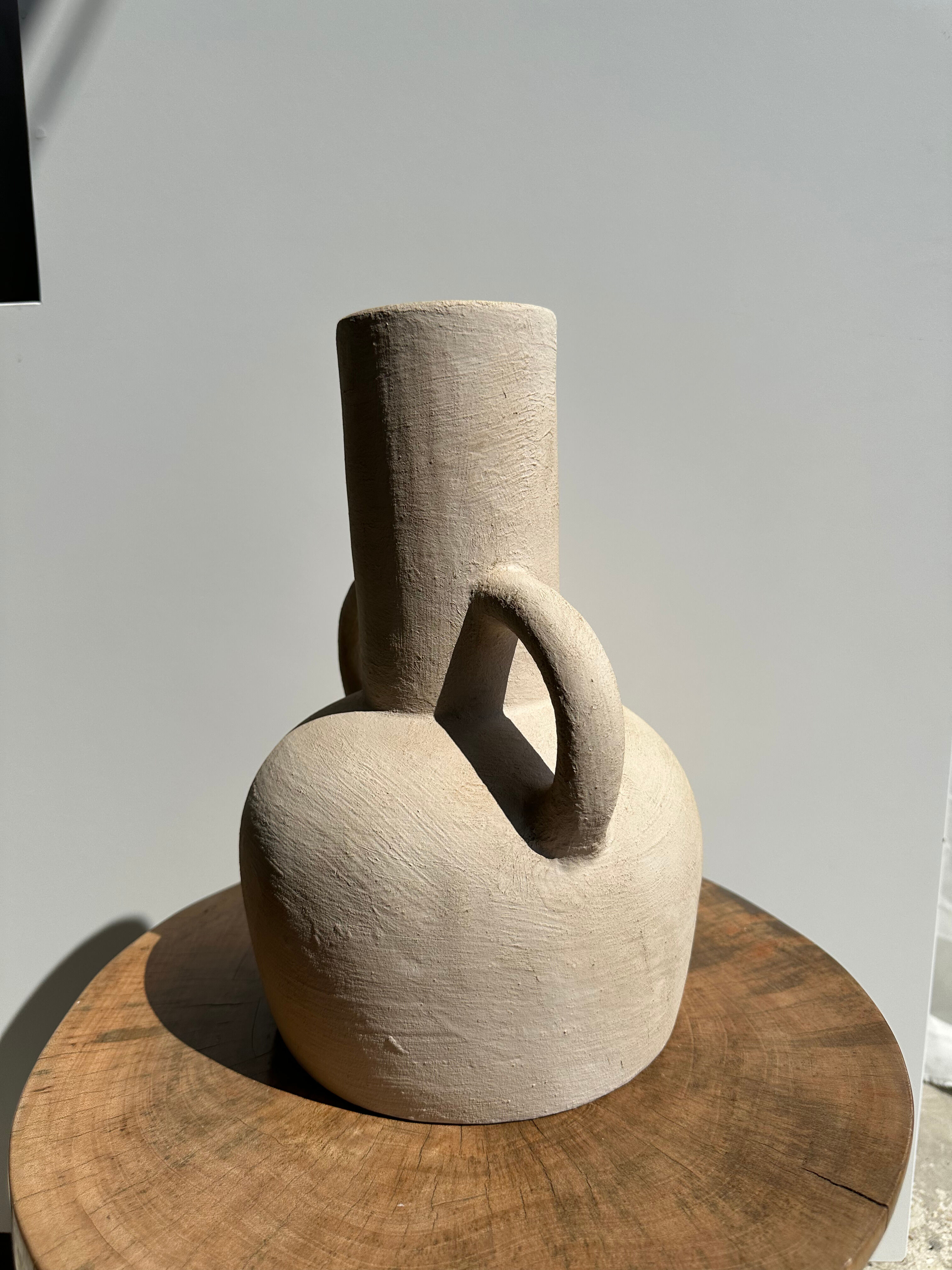 Handmade terracotta vase painted in beige with double handles h:32 d:25