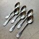 6 large Christofle silver-plated spoons with shell decoration.