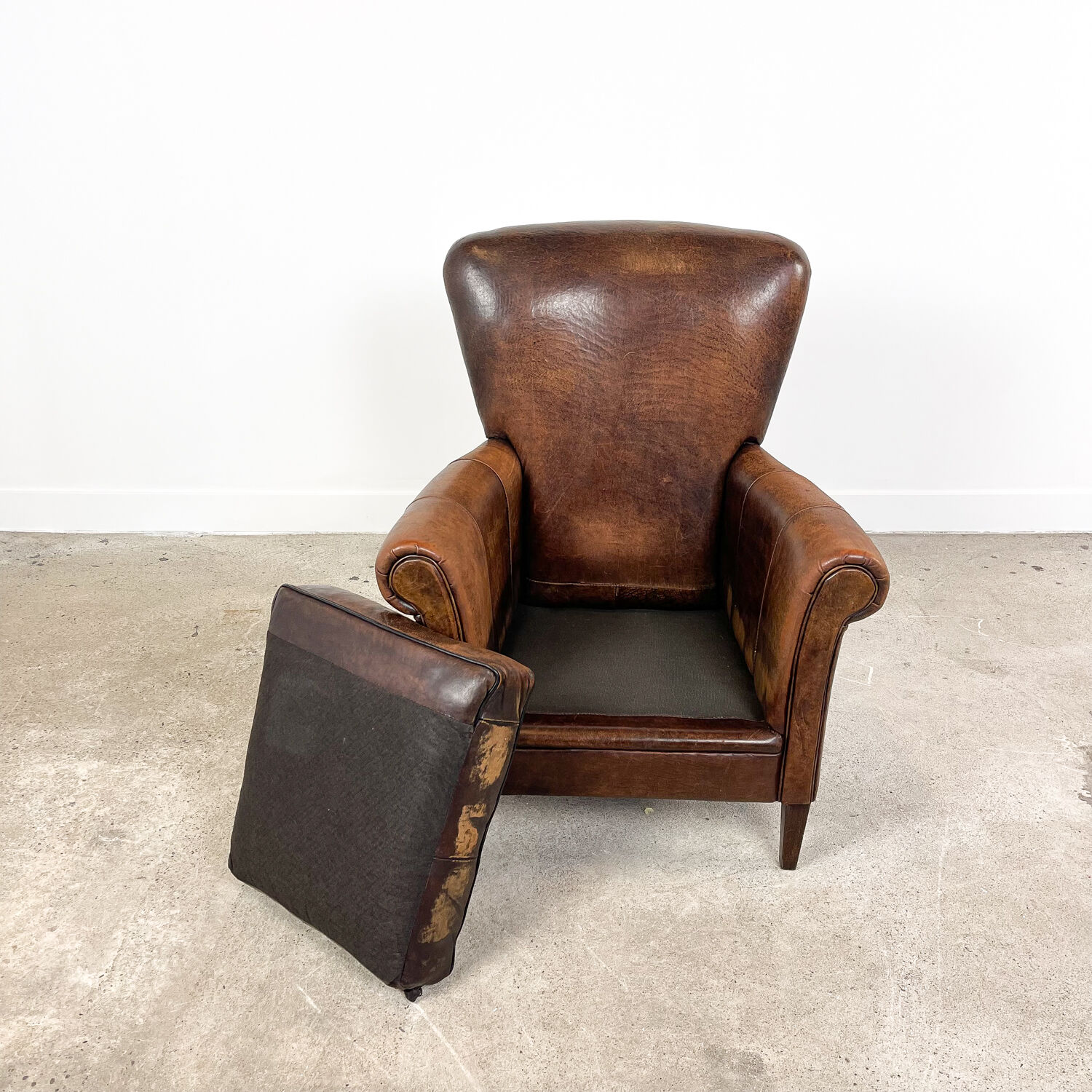 Vintage dark sheep leather club chair Achterdijk