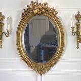 Mirror / oval ice Napoleon III period in wood and gilded stucco louis xv style