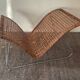Magazine holder in woven rattan and metal
