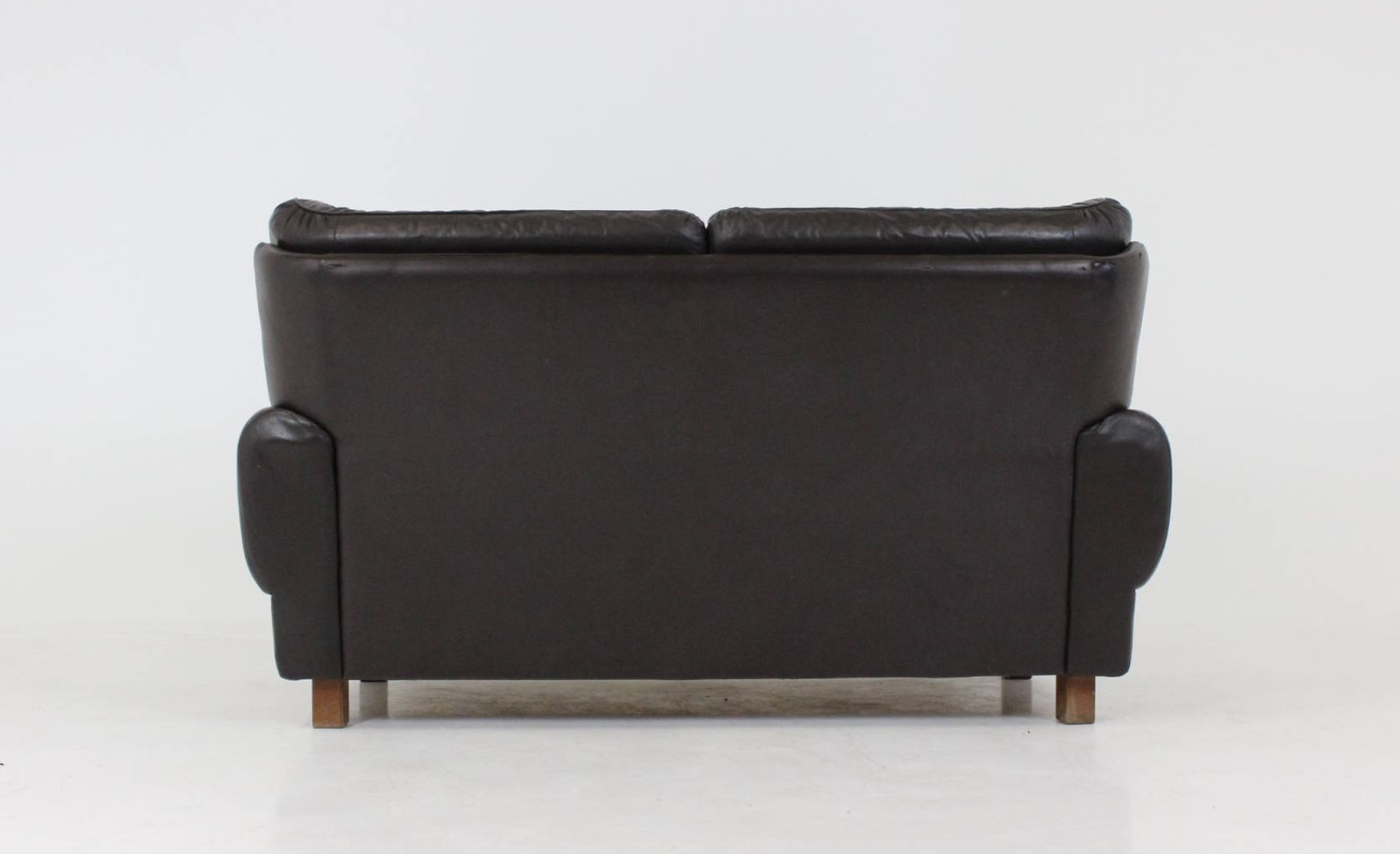 Mid-century black leather sofa
