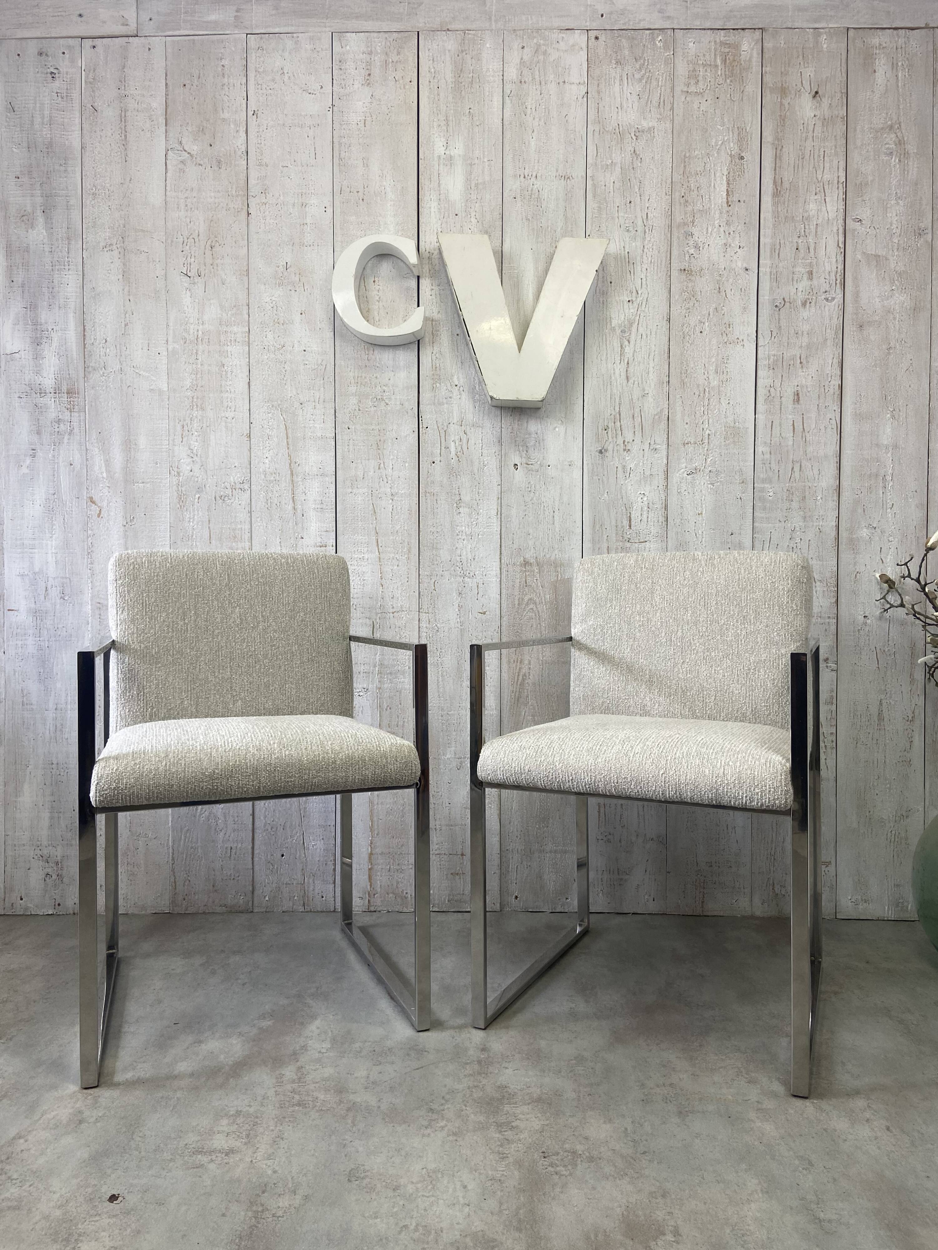 Pair of stainless steel armchairs from the 70s