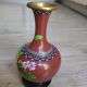 Chinese vase inclusions, brass with support
