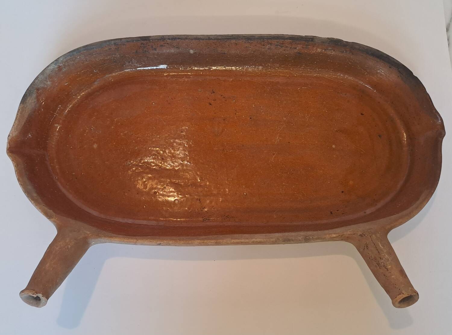 Old glazed terracotta frying pan from the 19th century.