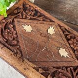 Carved wooden box with brass inlay