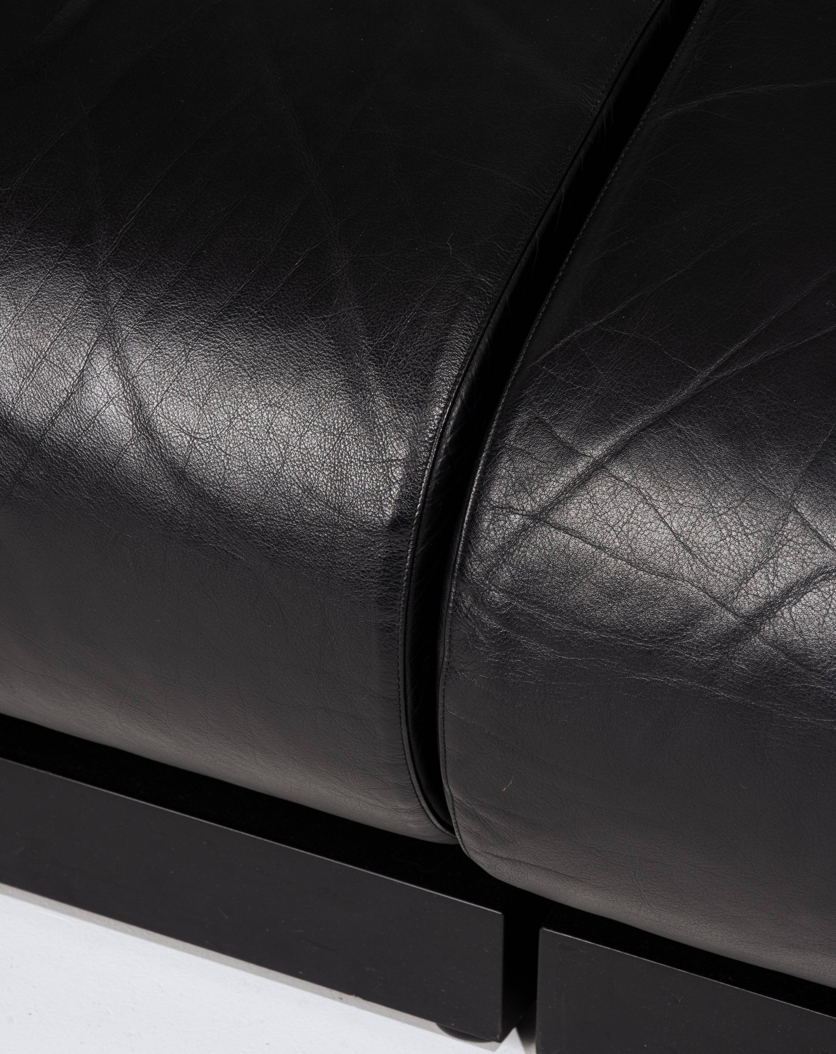 Obliqua two-seater leather sofa, Mario Botta, 1980s