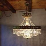 Antique castle style chandelier with tassels and floral details