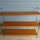 Wall shelve in black metal and the 1960s teak