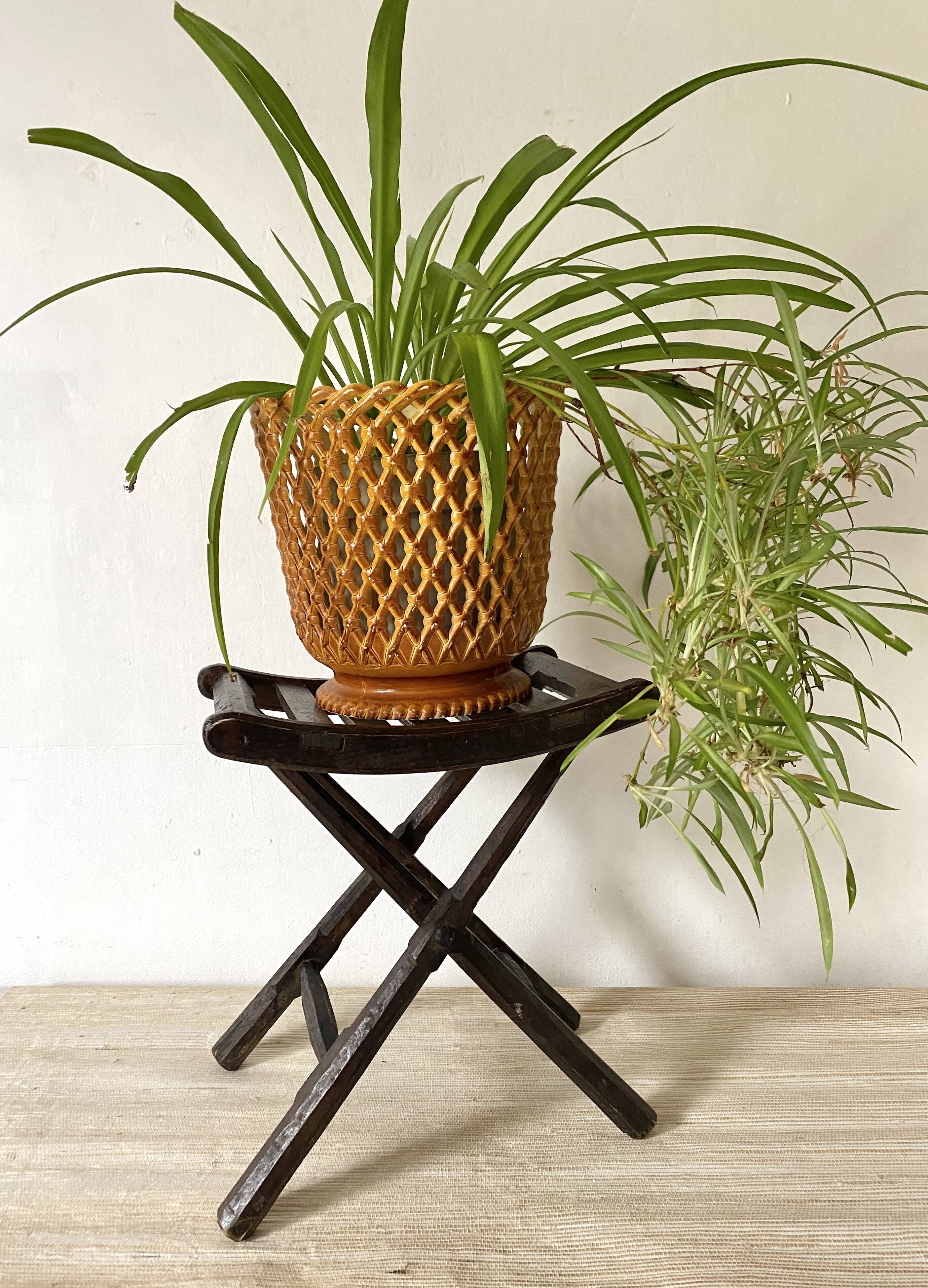 Folding slatted wooden stool