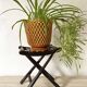 Folding slatted wooden stool