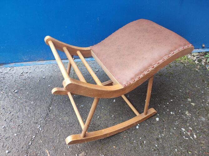 Wooden rocking footrest and vintage imitation