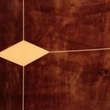 Iconic Aldo Tura brown goatskin bar cabinet with electric lift & mirror interior.